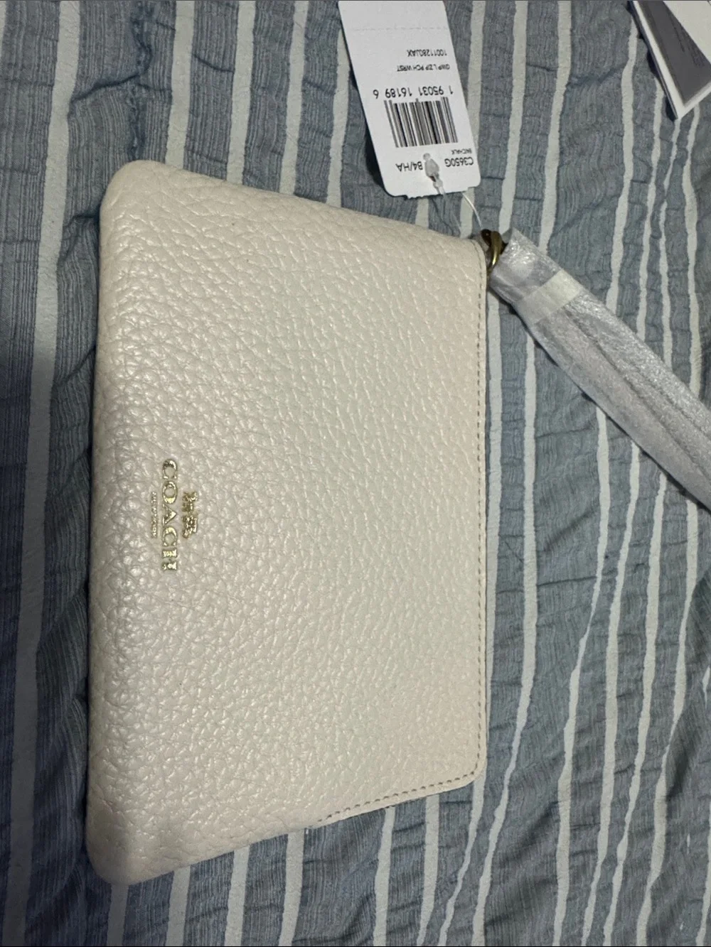 COACH Cream Pebbled Leather Wristlet Clutch with Gold Logo
